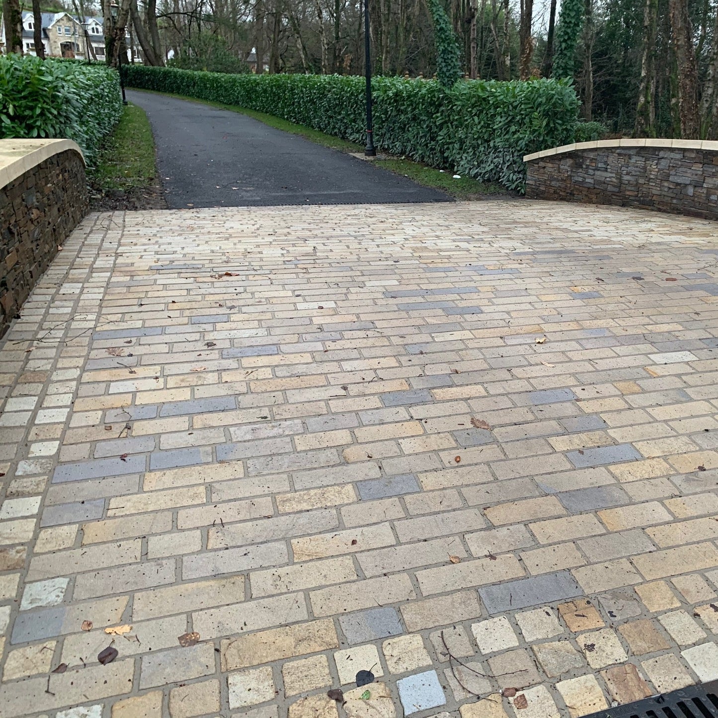 Paved bridge using Mountcharles Sandstone Paving Setts in RL x 100mm and 100 x 100mm Border. 