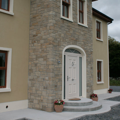 Stone façade featuring McMonagle Sandstone Stoneer Cladding flats and corners. 