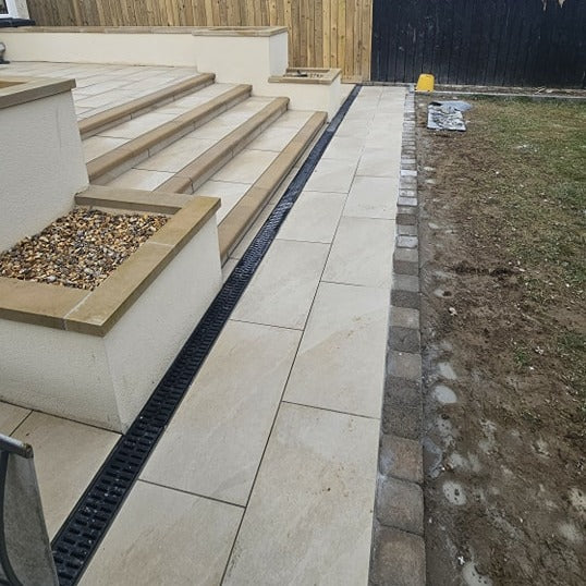Wall planter completed with decorative Mountcharles sandstone wall capping.