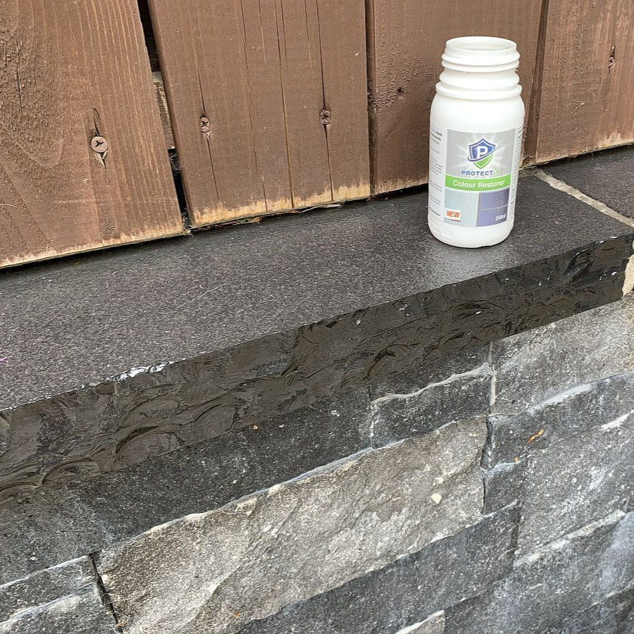 Black Limestone Wall Capping with PROTECTiT Colour Restorer applied to enhance the dark tones and seal the stone. 