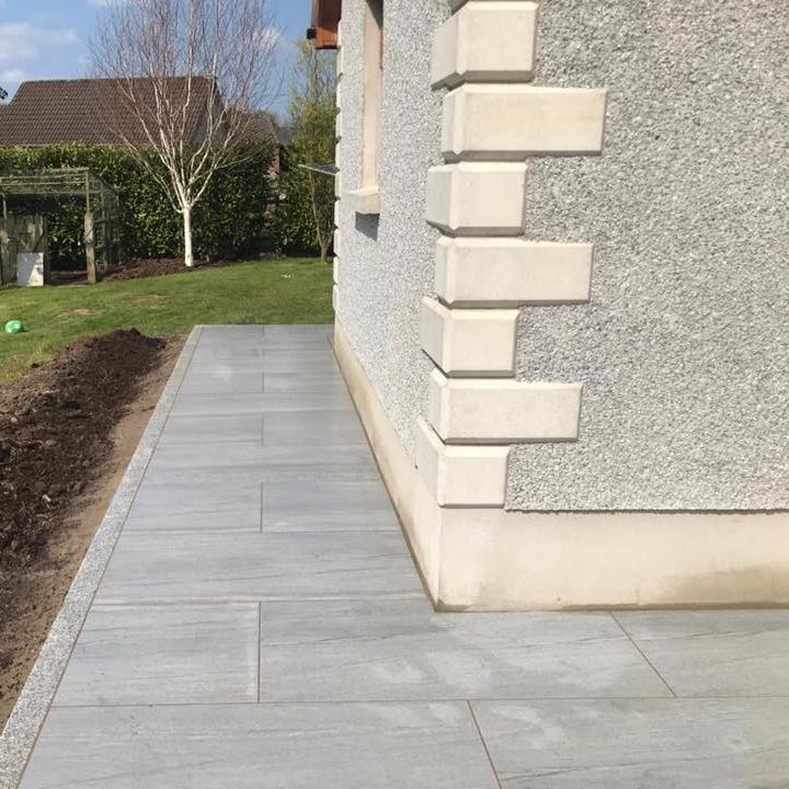 Pathway completed using Pietra di Vals porcelain tiles.