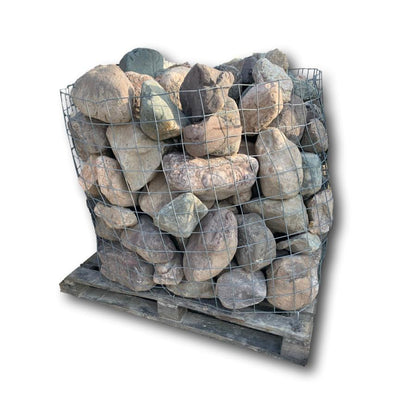 Cage of Pink Sperrin Granite Mix Rockery against a white background. 