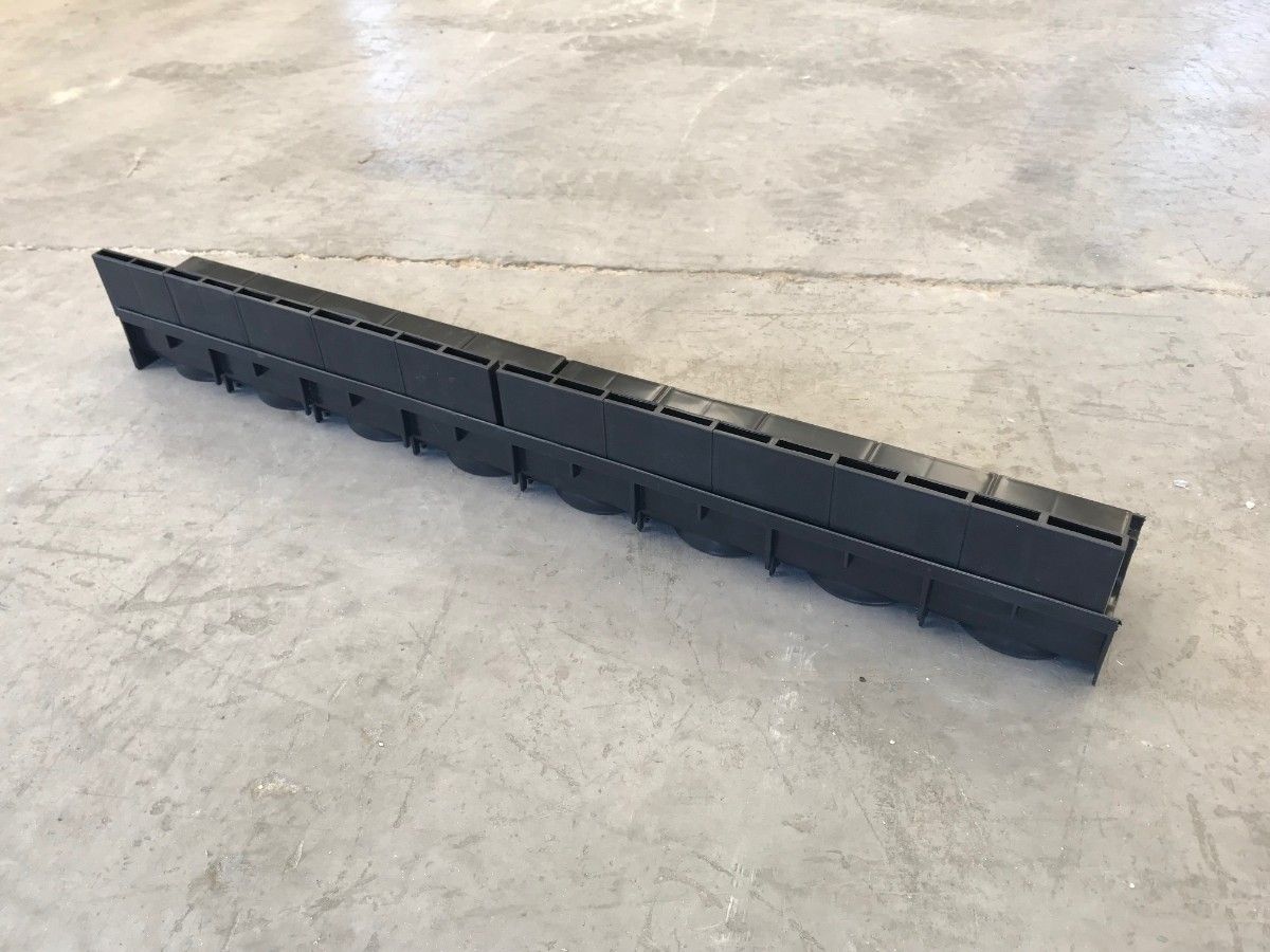 Poly Brick Slot Channel Drain on floor. 