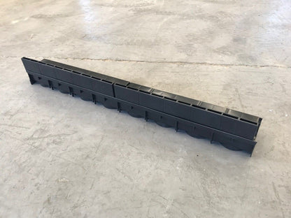 Poly Brick Slot Channel Drain on floor. 