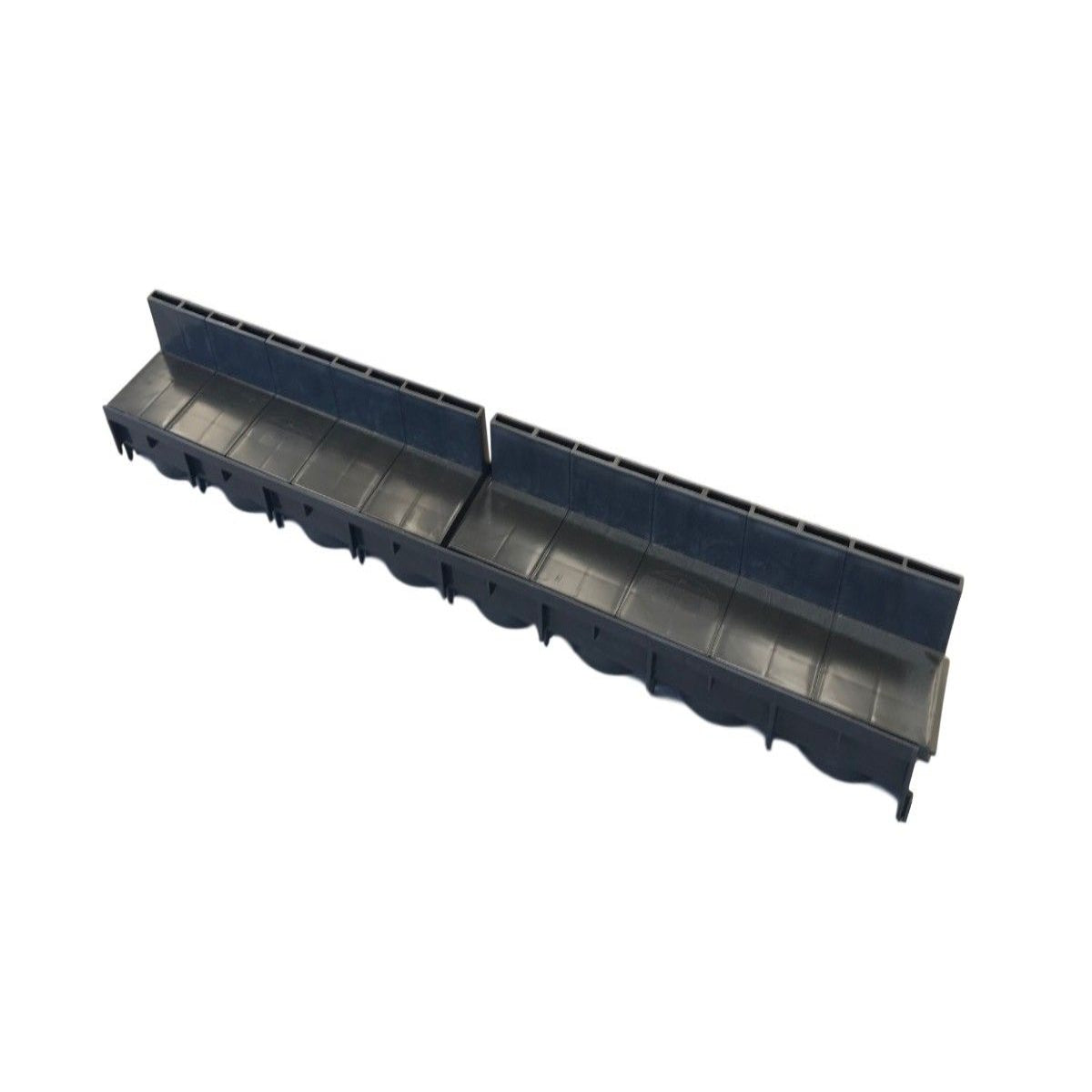 A black poly brick slot channel drain designed for use in slab or block paving for drainage solutions.
