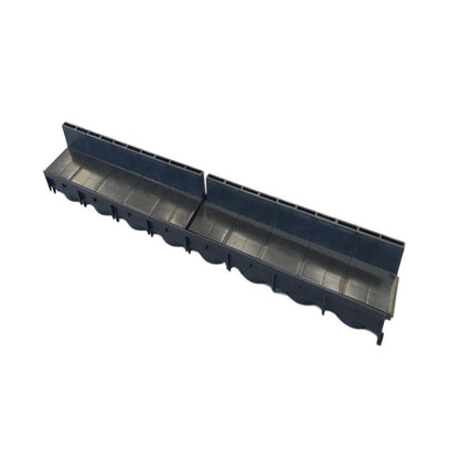 A black poly brick slot channel drain designed for use in slab or block paving for drainage solutions.