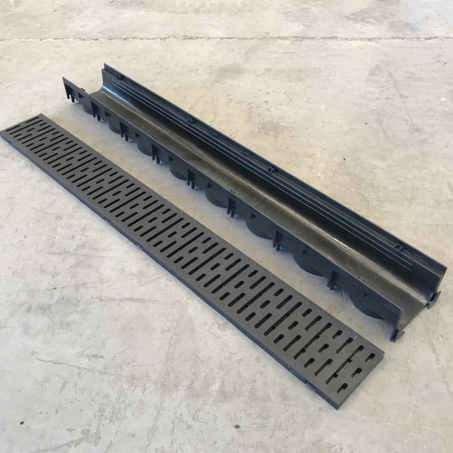 STORA LIGHT PVC 80mm Channel Drain laying on the floor. 