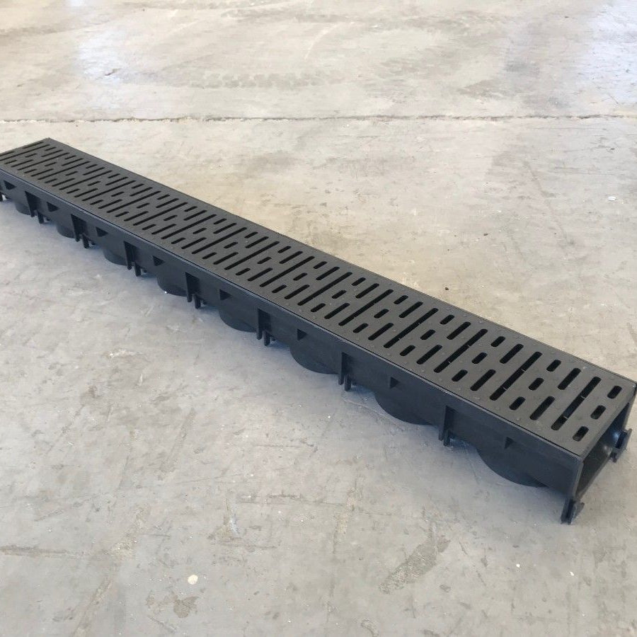STORA LIGHT PVC 80mm Channel Drain laying on the floor. 