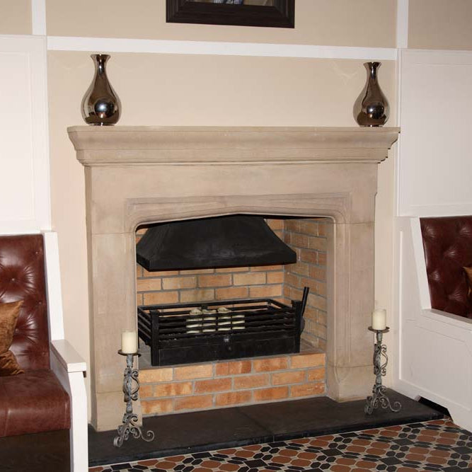 Traditional Sandstone Fireplace Surround in a hotel. 