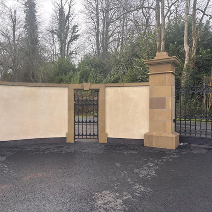 Bespoke Sandstone Entrance Pillars with bespoke sandstone surround, capping, cladding and plinths. 