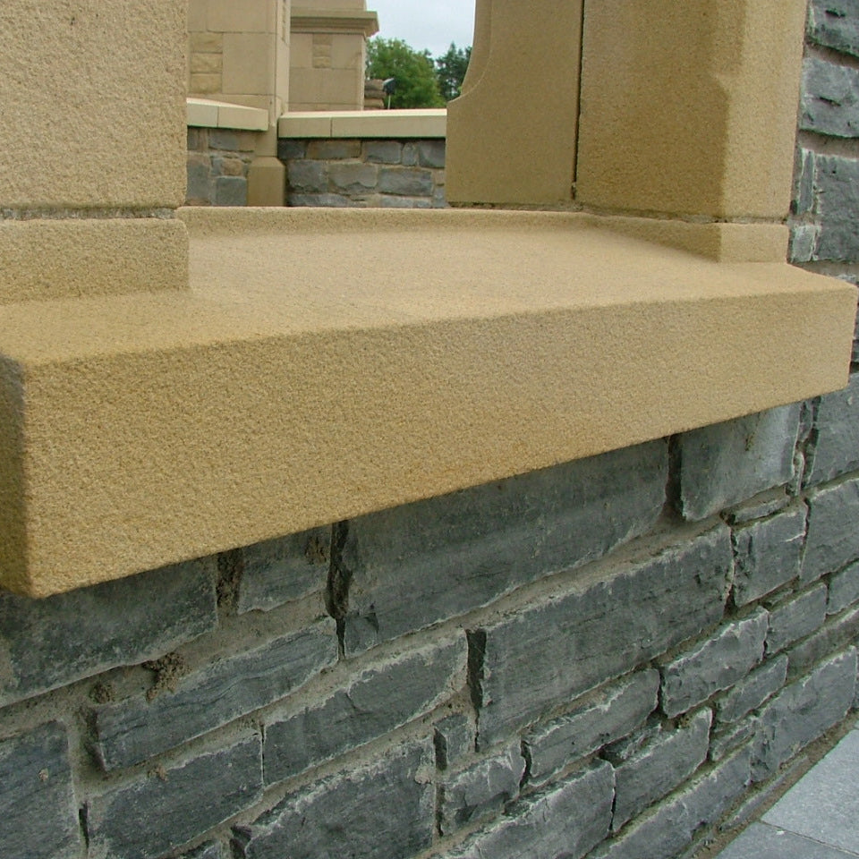 Close up of Sandstone Sill with Bush Hammered Sill. 