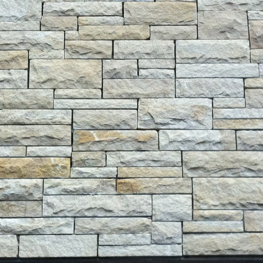 Close up detail of Sawn Bed Sandstone Machined stonework.