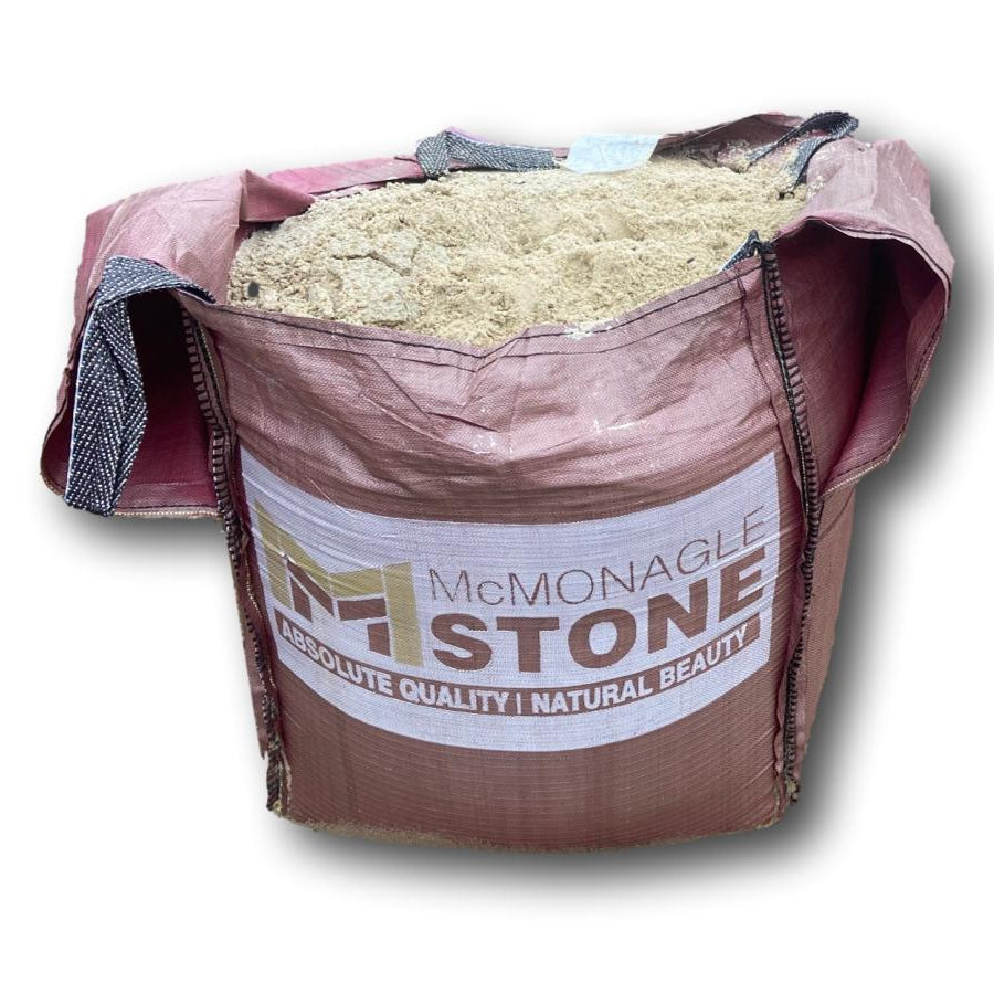 Bag of McMonagle Stone's Self Binding Donegal Quartzite Gravel on a white background