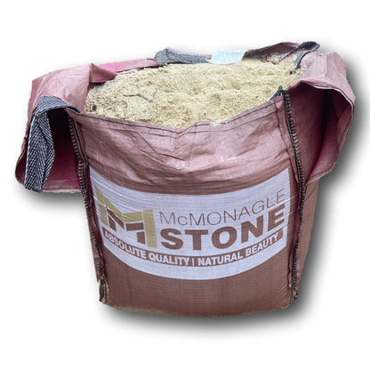 Bag of McMonagle Stone's Self Binding Donegal Quartzite Gravel on a white background