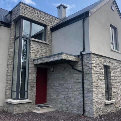 New build house featuring Silver Donegal Quartzite Stoneer Cladding. 