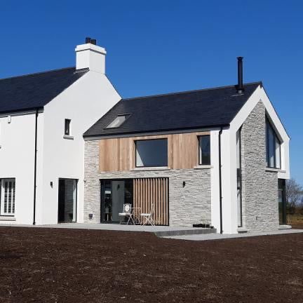 Modern new build completed using Silver Donegal Quartzite Stoneer Cladding. 