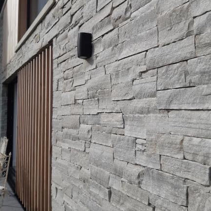 Close up of stonework in Silver Donegal Quartzite Stoneer Cladding. 