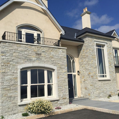Modern home with stone facades completed in 30mm Silver Donegal Quartzite Stoneer Cladding.