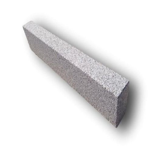 A single Silver Granite Kerb with a blasted finish. 