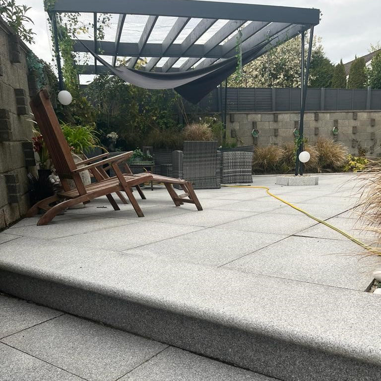 Patio area featuring Silver Granite Step and Paving in 600 x 600mm size. 