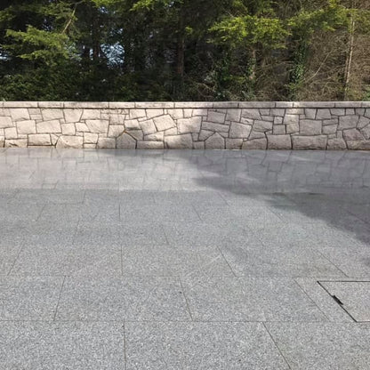 Patio area with Silver Granite Paving in 900 x 600mm size. 