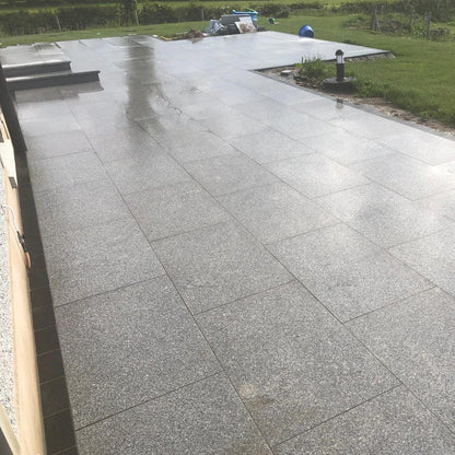 Patio area with steps Paving is Silver Granite Paving in 900 x 600mm size. 