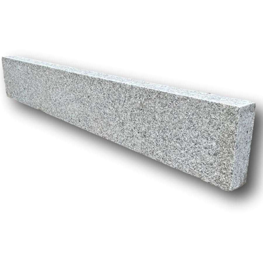 A single Silver Granite Pin Kerb with a blasted finish. 
