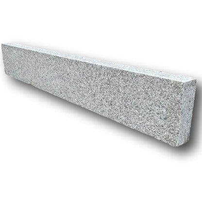 A single Silver Granite Pin Kerb with a blasted finish. 