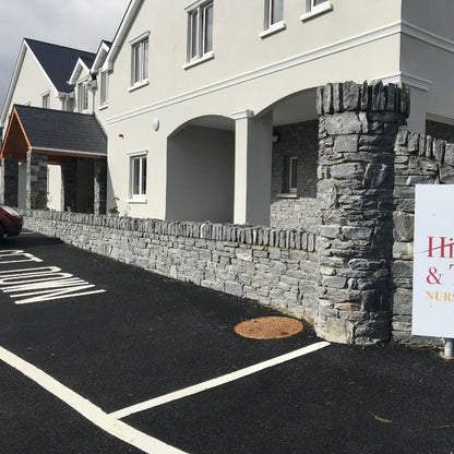 Nursing home with entrance wall finished in Silver Shale Machined.