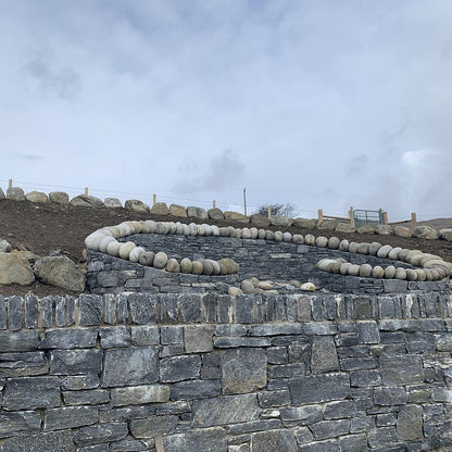 Garden walls completed using Silver Shale Machined building stone. 