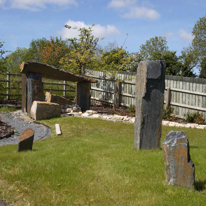 Garden design featuring slate monoliths of various sizes. 