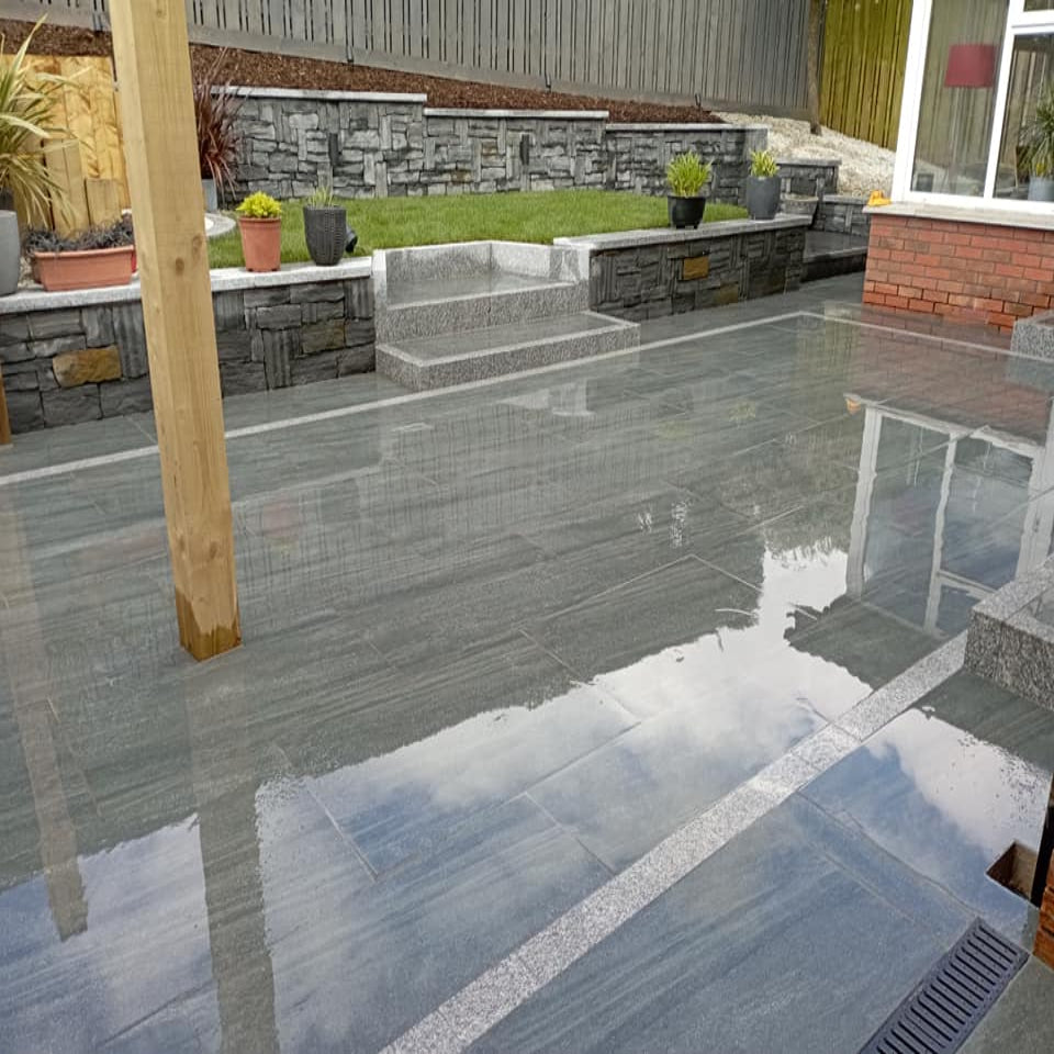 Outdoor patio completed using
Smokey Jewel Range Porcelain Paving Tiles in 900 x 600 x 20mm. 