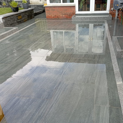 A porcelain tiled patio finished using 
Smokey Jewel Range Porcelain Paving Tiles. 