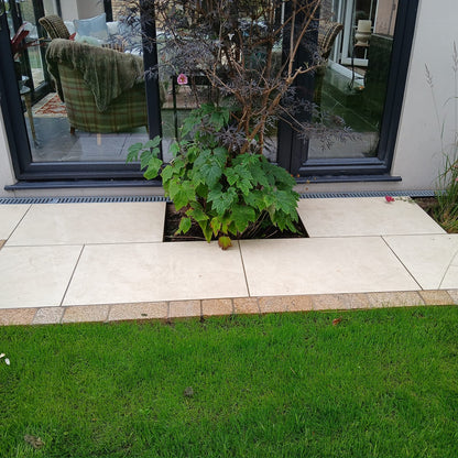 Pathway completed using Station White porcelain paving tiles in a garden setting. 