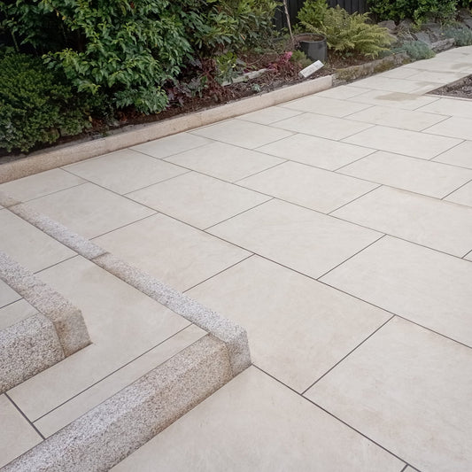 Patio area and steps completed using Station White Jewel Range Porcelain Paving. 