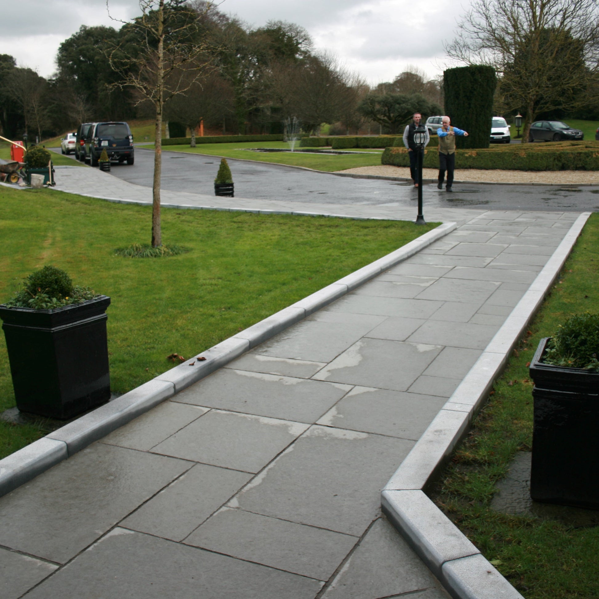 Pathway completed using T-Grey Limestone Paving in mixed patio pack sizes. 
