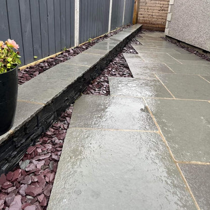 Pathway in T-Grey Limestone Paving leading to backyard. 