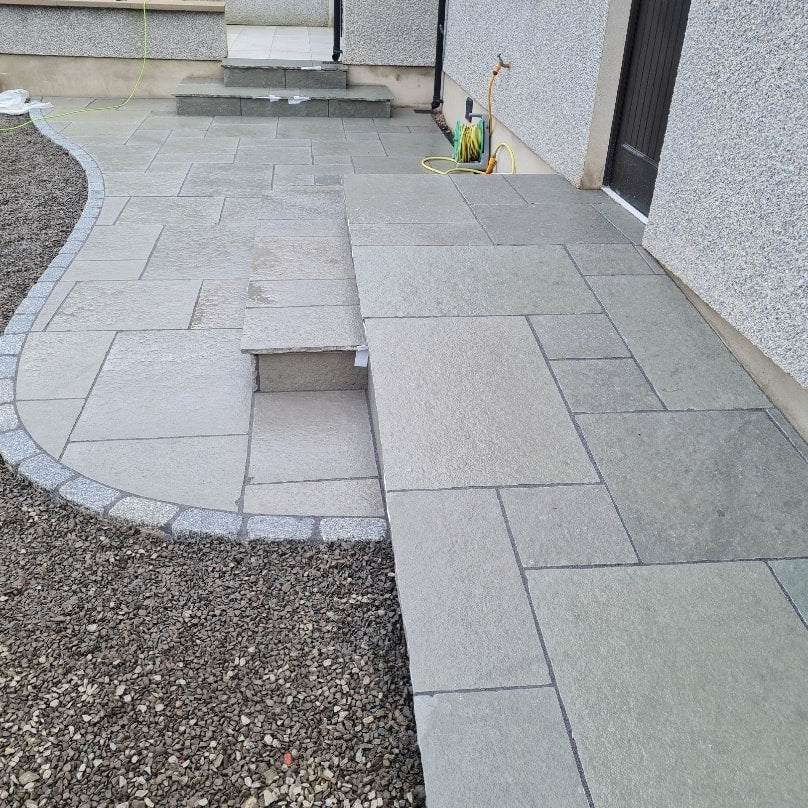 Ramp and small patio area completed using T-Grey Limestone Patio Packs. 