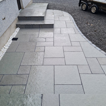 Steps and small patio area completed using T-Grey Limestone Patio Packs.