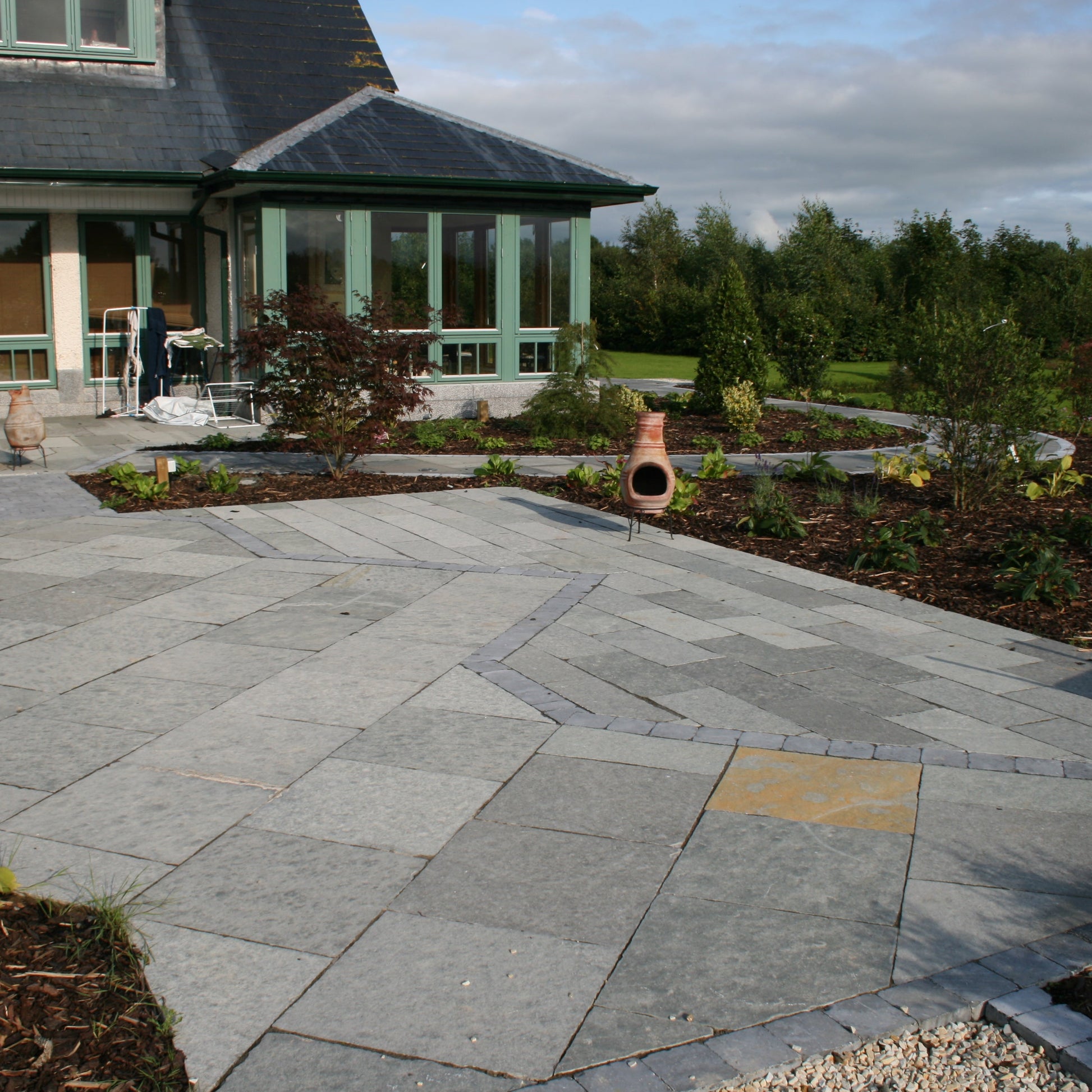Patio area created using T-Grey Limestone in mixed patio pack sizes. 