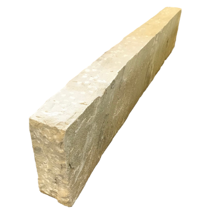 A single Tinted Mint Sandstone Kerb with a hand dressed finish on a white background. 