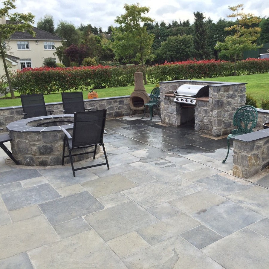 BBQ area with firepit completed using white limestone walling stone. 