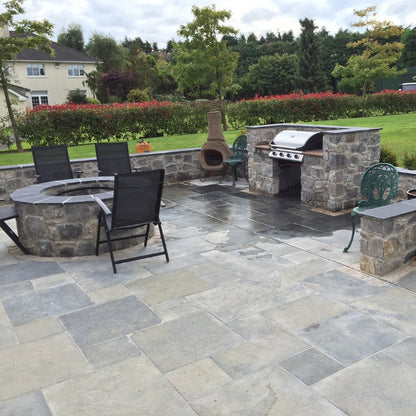 BBQ area with firepit completed using white limestone walling stone. 