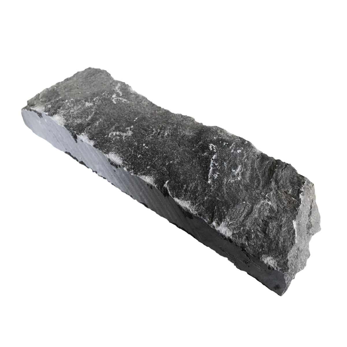 A single flat piece of white limestone with natural edges and a rough texture.