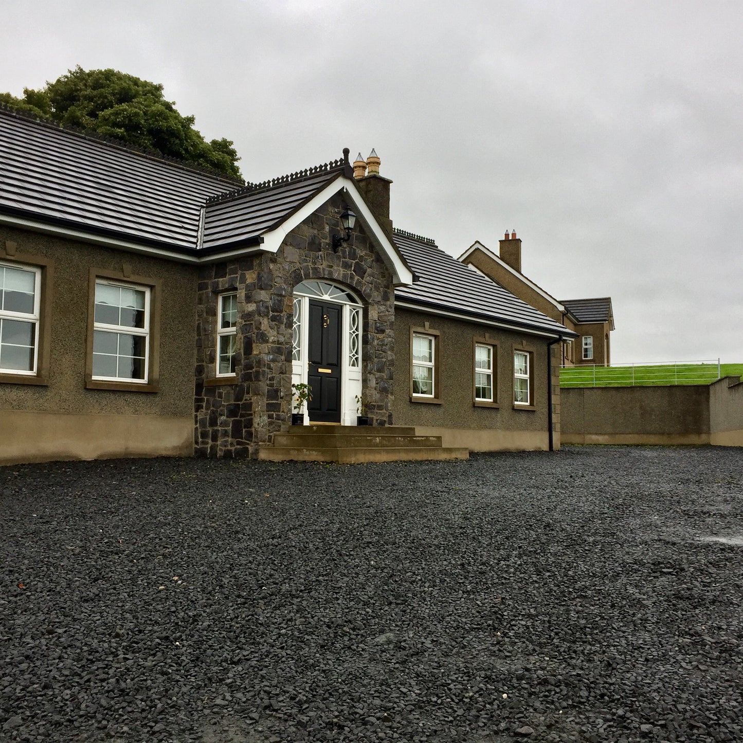 Front porch on a bungalow cladded in White Limestone Stoneer Cladding. 