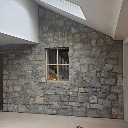 Internal stone feature wall completed using white limestone stoneer cladding. 