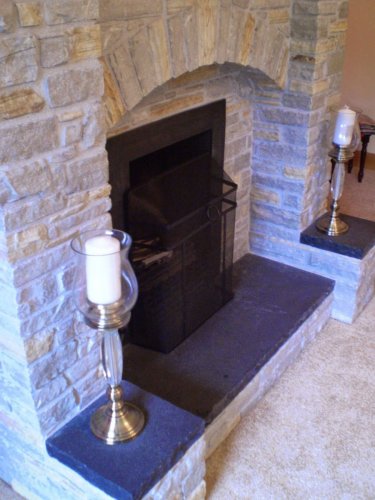Silver Donegal Quartzite Fireplace with a splash of Gold Donegal Quartzite - Machine Block 