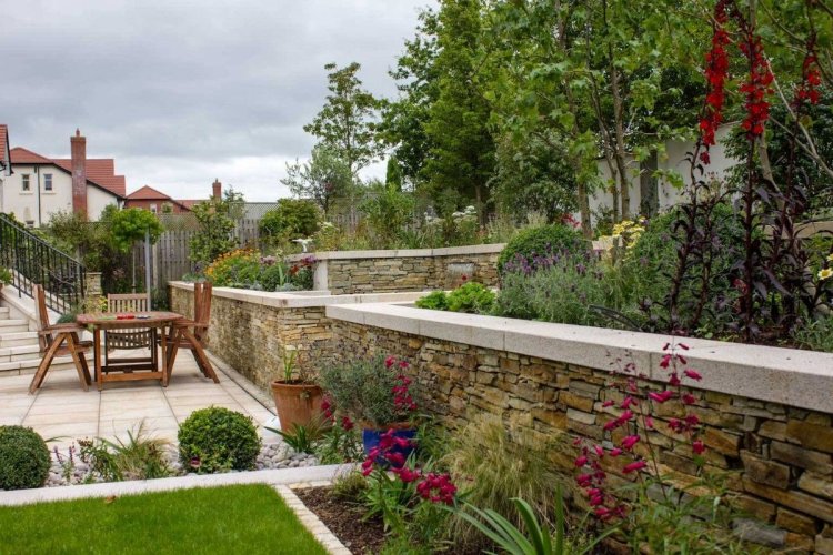 Gold Granite Wall Capping - Photo Credit: Tully Landscapes 