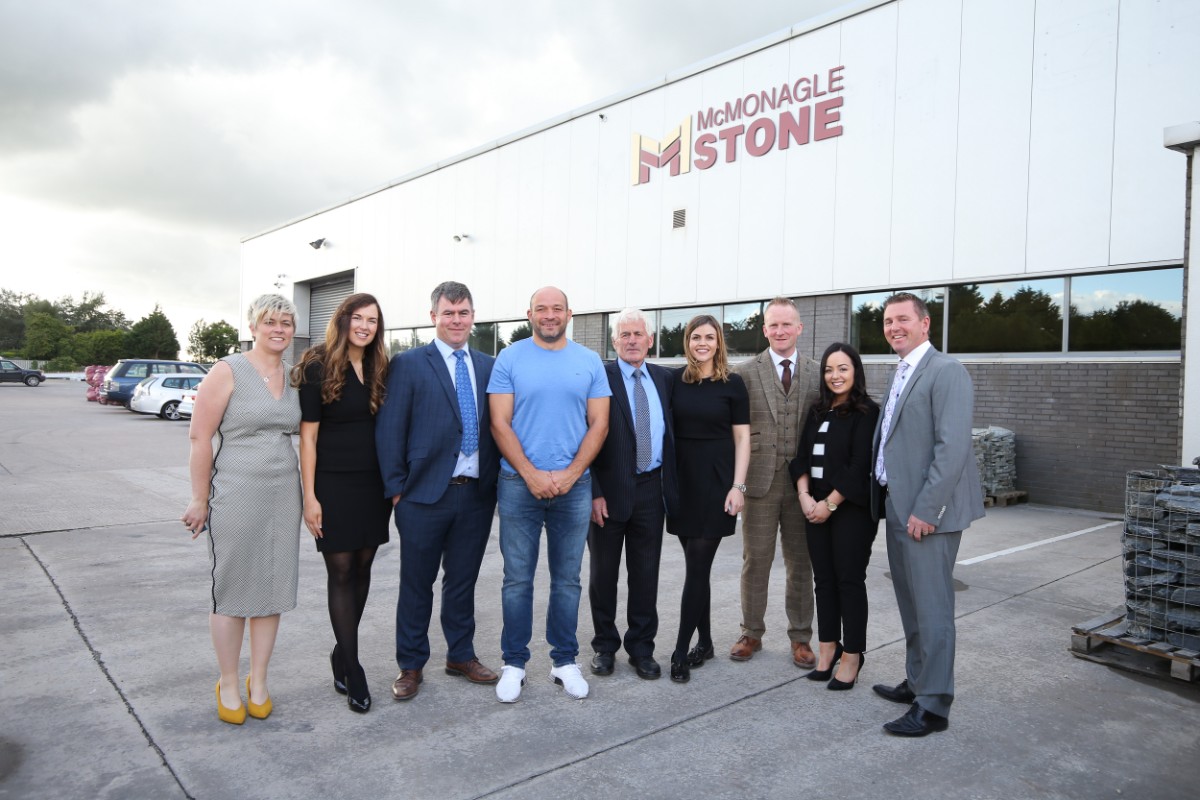 McMonagle Stone Team pictured with Rory Best outside new showroom in Lisburn, Northern Ireland. 